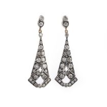 A pair of diamond earrings, each suspending a tapering drop, set with brilliant-cut diamonds