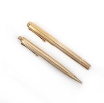 Pelikan, a 14ct gold mechanical pencil, with engine-turned decoration, length 13cm, with a 14ct gold