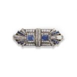 An Art Deco sapphire double clip brooch, 1930s, each clip centring on a cushion-shaped sapphire,