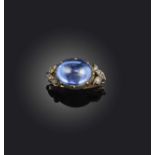 A sapphire and diamond ring, late 18th century composite, set with a cabochon sapphire within