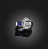 An Art Deco sapphire and diamond ring, 1930s, designed as a stylised buckle, set with circular-cut