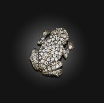 A diamond brooch, designed as a frog, pavé-set with cushion-shaped diamonds totalling