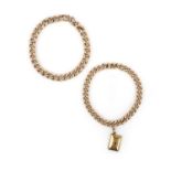 Two gold bracelets, circa 1900, each of curb linking, one suspending a charm designed as an envelope