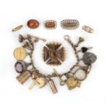 A collection of jewels including a charm bracelet, 19th/early 20th century, comprising: a jasper and