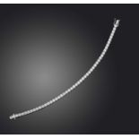 A diamond line bracelet, designed as an articulated line of brilliant-cut diamonds totalling