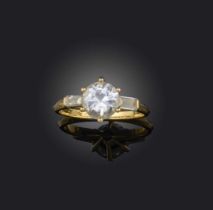 A diamond ring, claw-set with a circular-cut diamond weighing approximately 1.20 carats, to