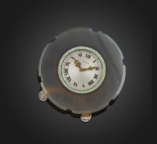 Cartier, an Art Deco agate and enamel desk timepiece, 1920s, the silvered guilloché enamel dial with