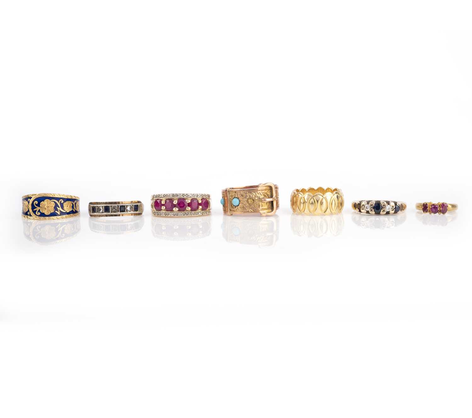 A collection of seven gold and gem-set rings, comprising: a Victorian 9ct gold and turquoise