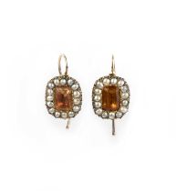 A pair of citrine, paste and pearl earrings, 19th century and later, each designed as a cluster, one