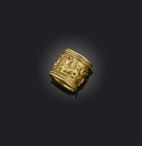 Elizabeth Gage, a gold Zodiac ring for Capricorn, decorated with sea-goats with a rope twist
