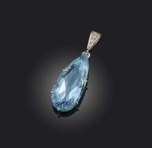 An aquamarine and diamond pendant, set with a pear-shaped aquamarine weighing approximately 30.00