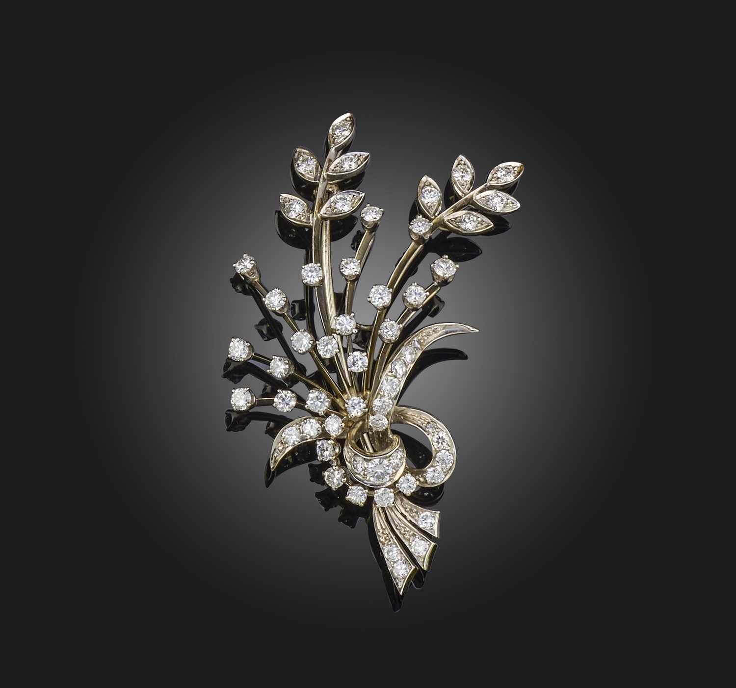 Birks, a diamond brooch, designed as a floral spray, set with brilliant-cut diamonds, mounted in