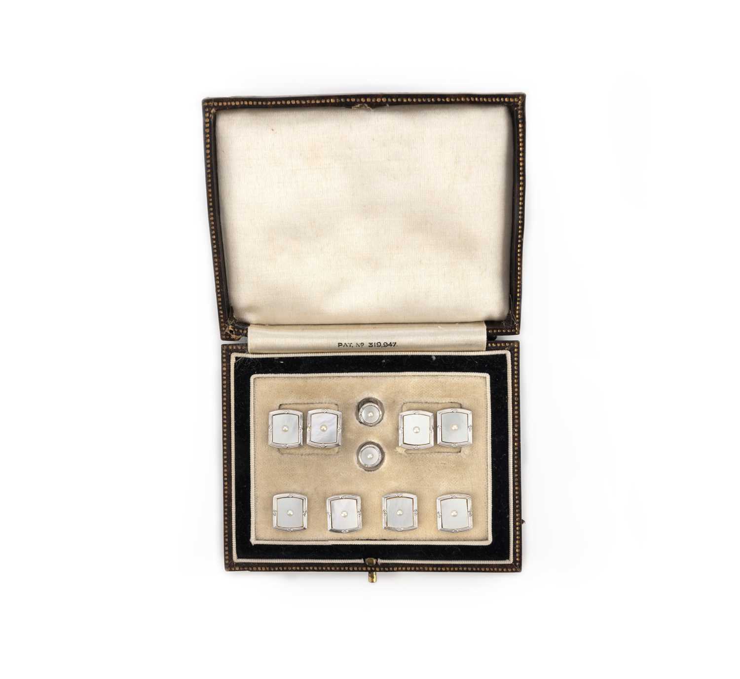 A mother of pearl and seed pearl dress set, early 20th century, comprising: a pair of cufflinks, - Image 2 of 2