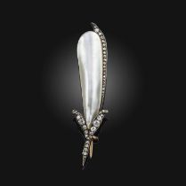 A Victorian mother of pearl and diamond brooch, late 19th century, designed as a pea pod in polished