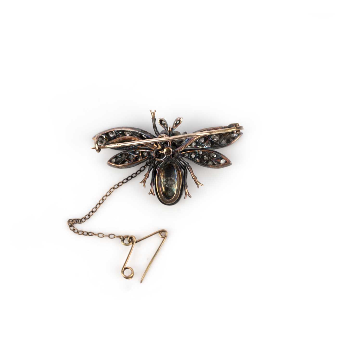 A Victorian diamond and ruby brooch, late 19th century, designed as a bee, set with cushion-shaped - Image 2 of 2