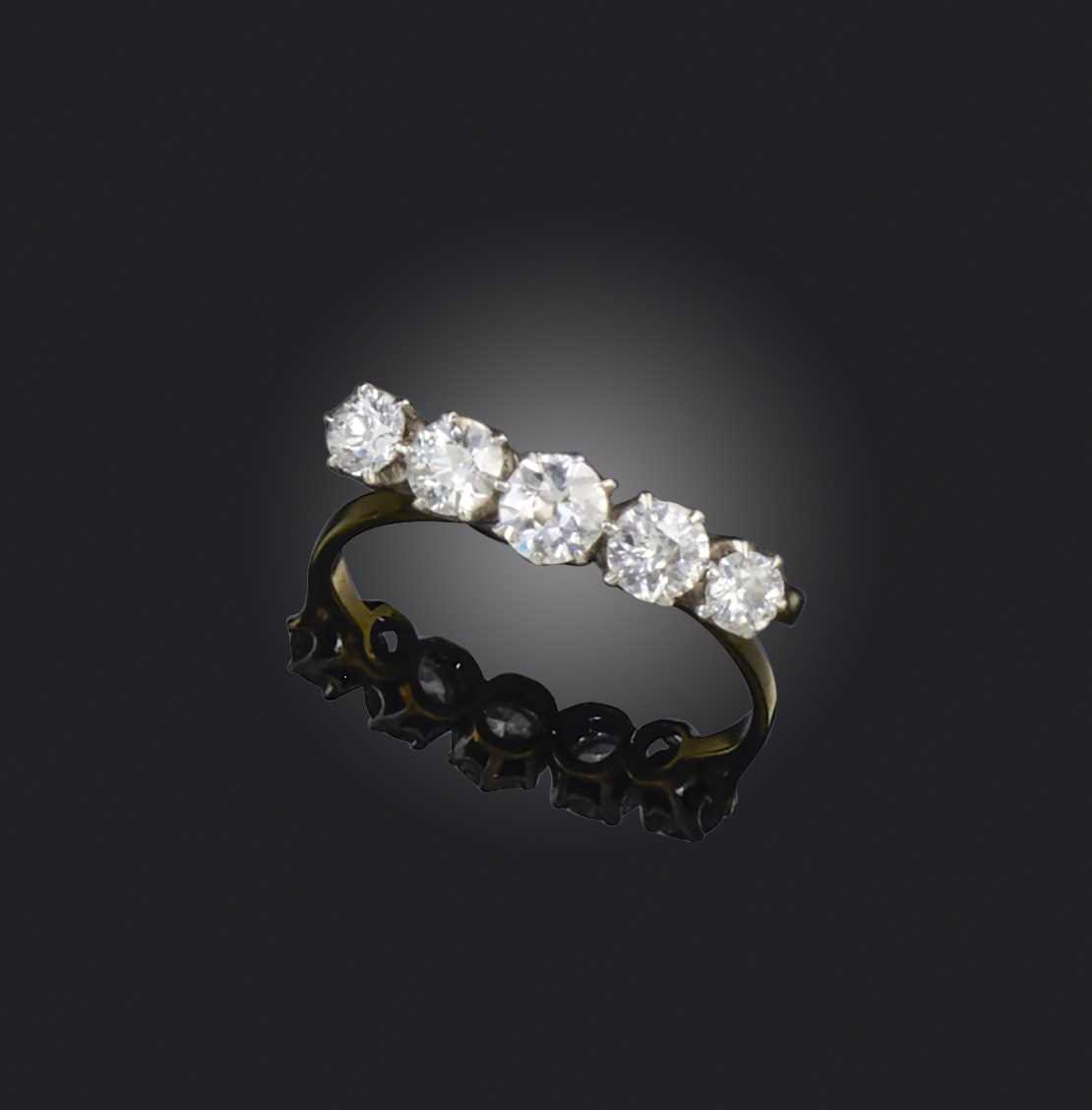 No reserve - a diamond ring, early 20th century, set with a sequence of five circular-cut diamonds