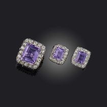 An amethyst and diamond demi-parure, comprising: a ring and a pair of earrings, each of