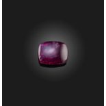 † † A loose sugarloaf cabochon ruby, weighing 3.47cts A verbal report from GCS states that the