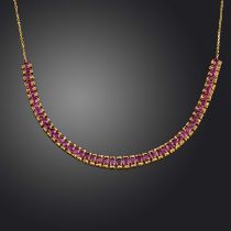 A ruby necklace, the front composed of links set with oval rubies totalling approximately 30.00