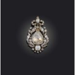 A diamond pendant/brooch, early 19th century and later, designed as a foliate frame set with