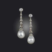 A pair of natural pearl and diamond drop earrings, early 20th century, each set with a cushion-