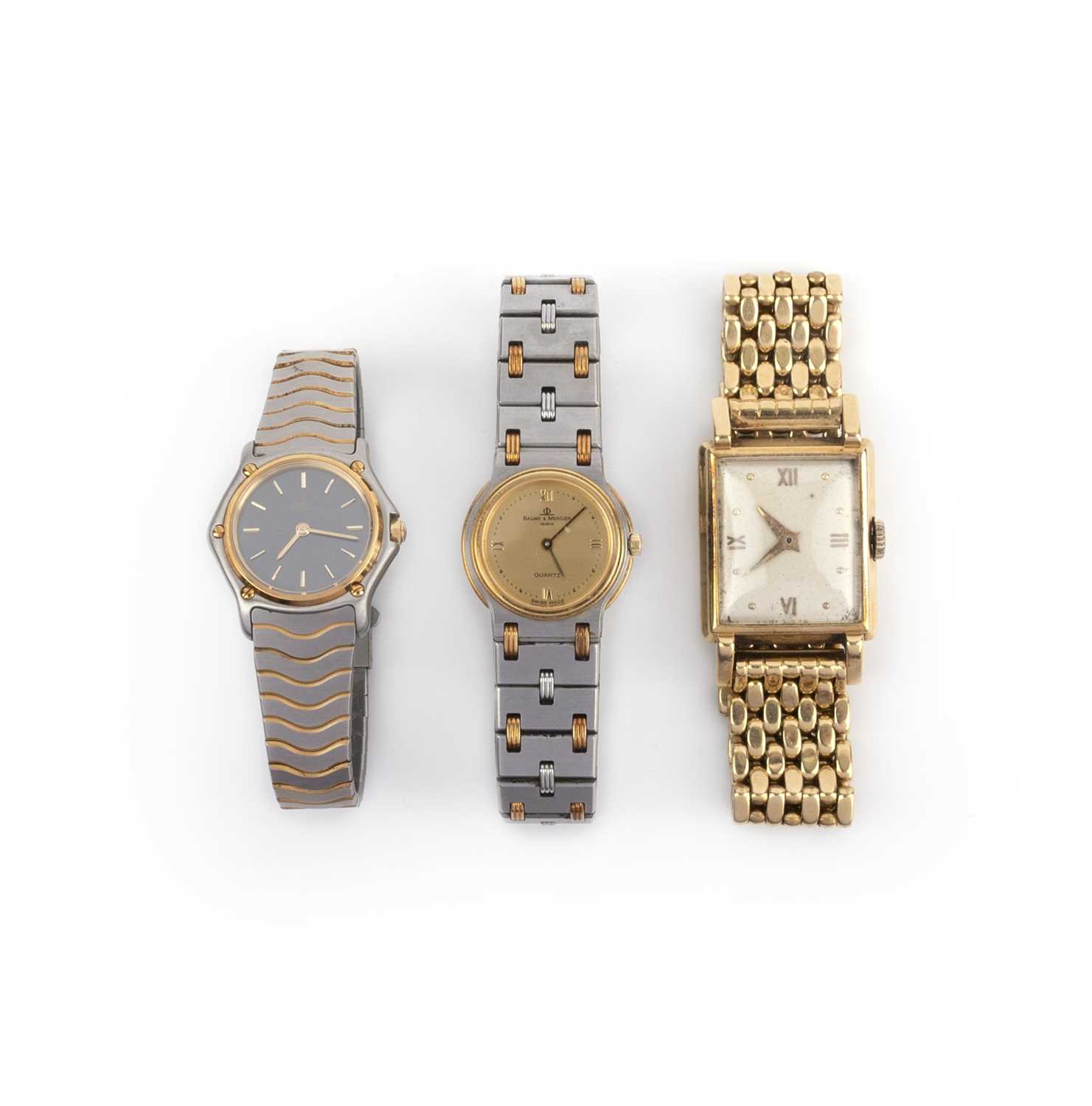 A group of three watches including a gold watch by Gubelin; comprising: a lady's stainless steel