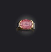 Marina B, a tourmaline ring, set with an oval pink tourmaline, to a gold band inlaid with sections