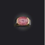 Marina B, a tourmaline ring, set with an oval pink tourmaline, to a gold band inlaid with sections