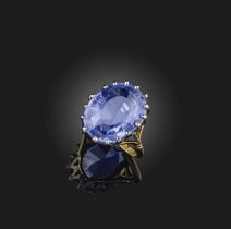 A sapphire solitaire ring, the oval-shaped sapphire weighing 11.83 cts, claw-set in platinum and