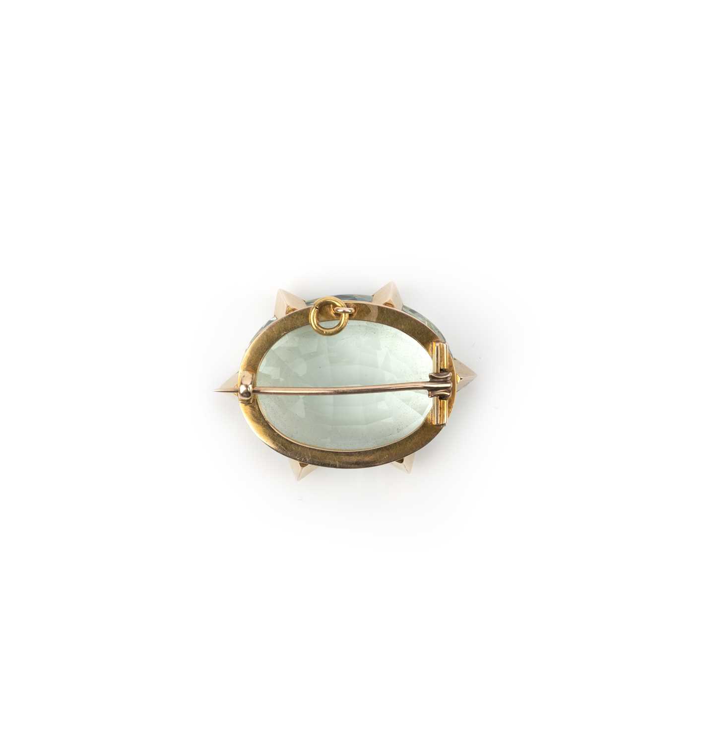 A large aquamarine brooch pendant, the oval aquamarine weighing over 100 carats, with triangular - Image 2 of 2