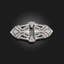 An Art Deco diamond double clip brooch, 1930s, of geometric design, set with single-cut, circular-