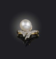 A natural pearl and diamond ring, early 20th century, of foliate design, set with a natural pearl