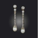 A pair of natural pearl and diamond earrings, early 20th century, each designed as a graduated