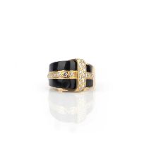 An onyx and diamond ring, of stylised buckle design, set with polished onyx and pavé-set with