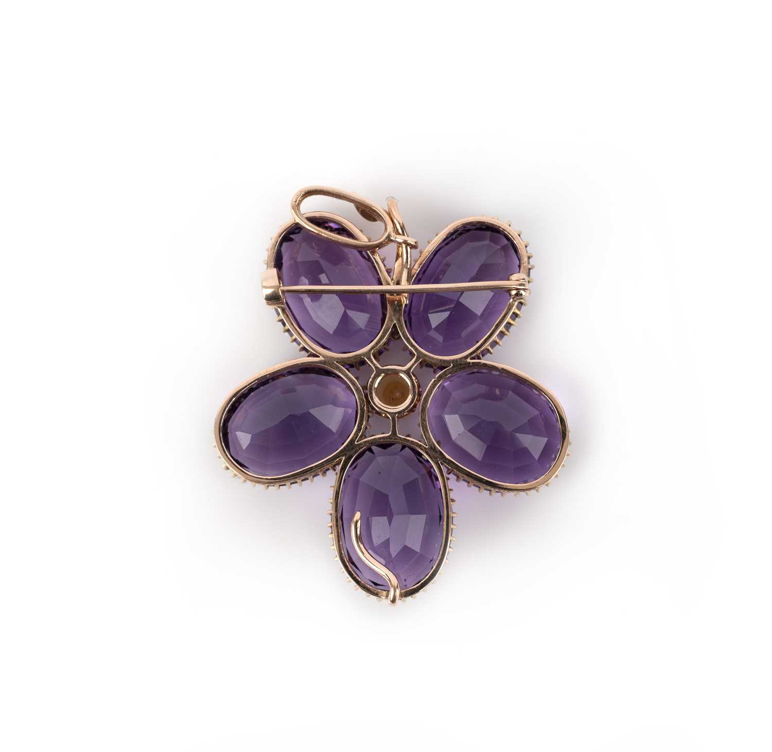 An early 20th century amethyst flower brooch / pendant, set with five matched oval amethysts - Image 2 of 2