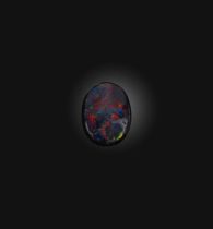 †A loose solid black opal weighing 2.21cts