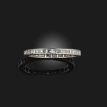 An Art Deco diamond eternity ring, 1920s, channel-set with a continuous band of carré-cut