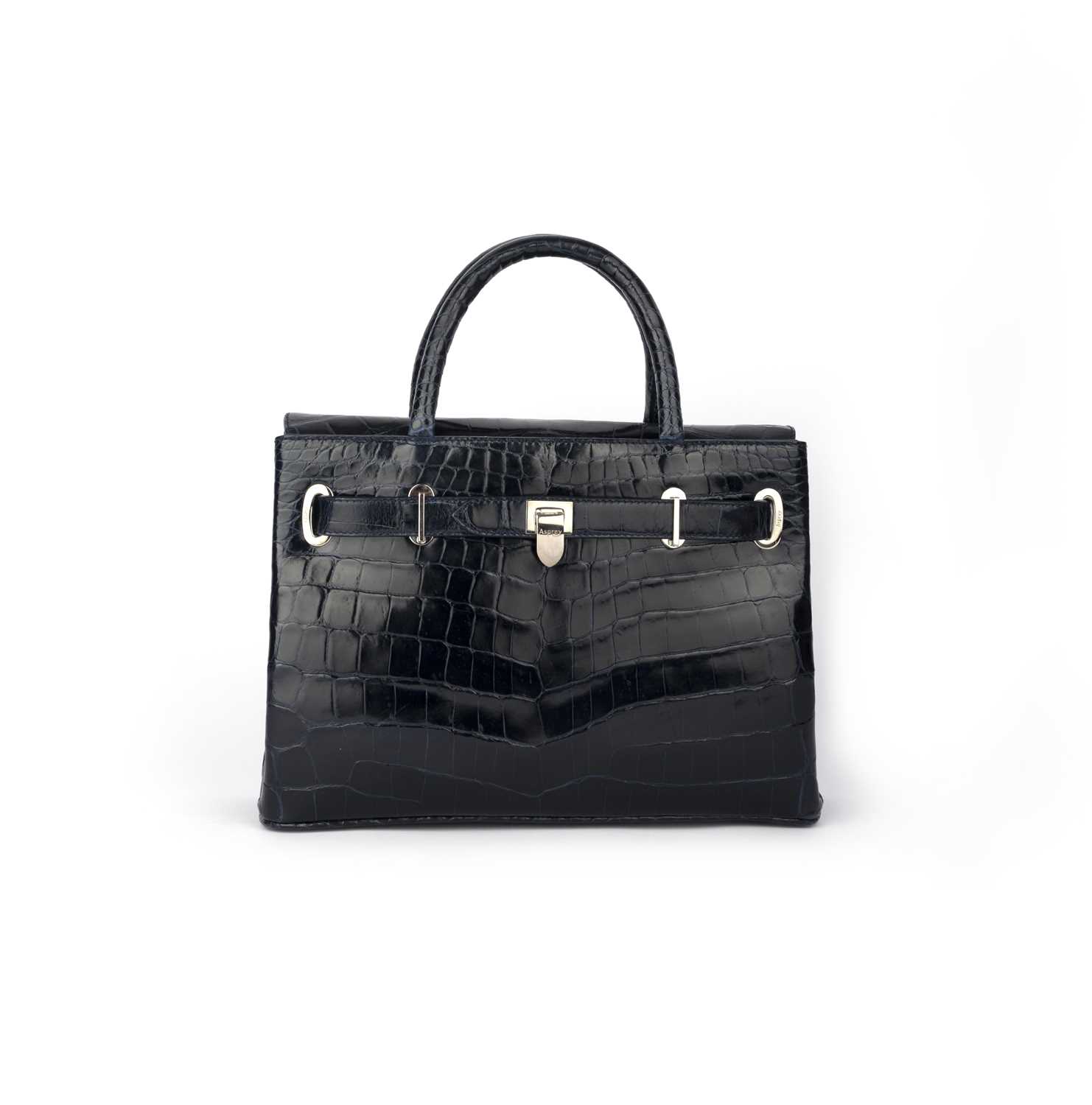 λ Asprey, a navy crocodile handbag 28.5cm wide, 20cm high, 10cm handle drop, includes coin purse,
