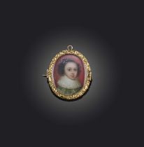 λ A George III portrait miniature mourning jewel, early 19th century composite, of oval outline, set