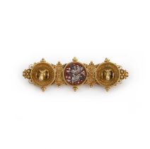 A gold and micromosaic brooch, 1870s, designed in the Archaeological Revival style, centring on a