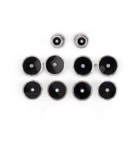 A cased dress set of cufflinks and six studs, each black onyx circular disc is centred with a