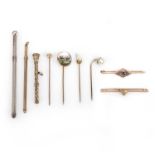 A collection of stick pins and brooches, late 19th/early 20th century, comprising: a gold bar brooch