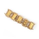 No reserve - a gold bracelet, composed of rectangular gold ingots, each stamped with a design of