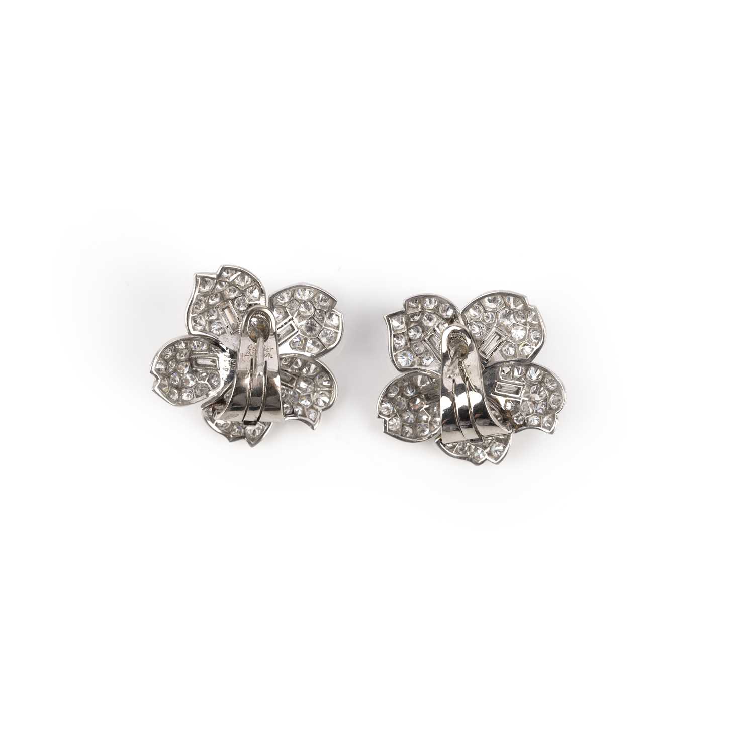 Cartier, a pair of diamond earrings, 1950s, each designed as a five-petalled flower, set with - Image 4 of 5