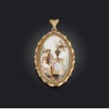 λ A late 18th century gold mourning pendant, depicting the portrait of a woman in mourning, on ivory