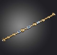 An aquamarine and diamond bracelet, composed of heart-shaped and banded links, set with three step-