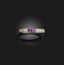 An Art Deco ruby and diamond eternity ring, early 20th century, set with a continuous band of