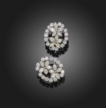 A pair of diamond cluster earrings, each set with a pair of diamond-set flowerheads set with