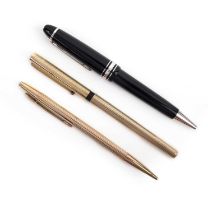 Montblanc, two pens and a propelling pencil, comprising: a stainless steel and black enamel ball