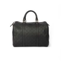 Gucci, a small dark brown GG leather Boston duffle 30.5cm wide, 26cm high, 9cm handle drop, includes